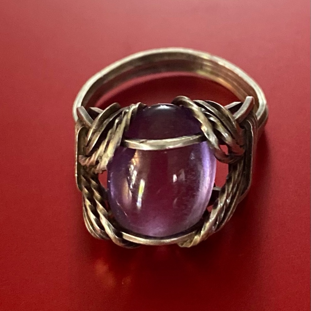 Handcrafted Sterling Silver Ring with amethyst wire wrapped.